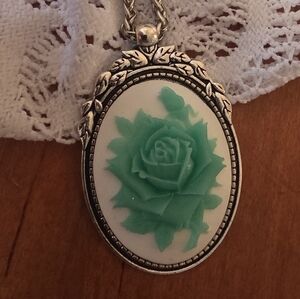 Teal Rose on White Cameo in Silver Tone Bezel Frame on 23 Inch Silver Tone Chain